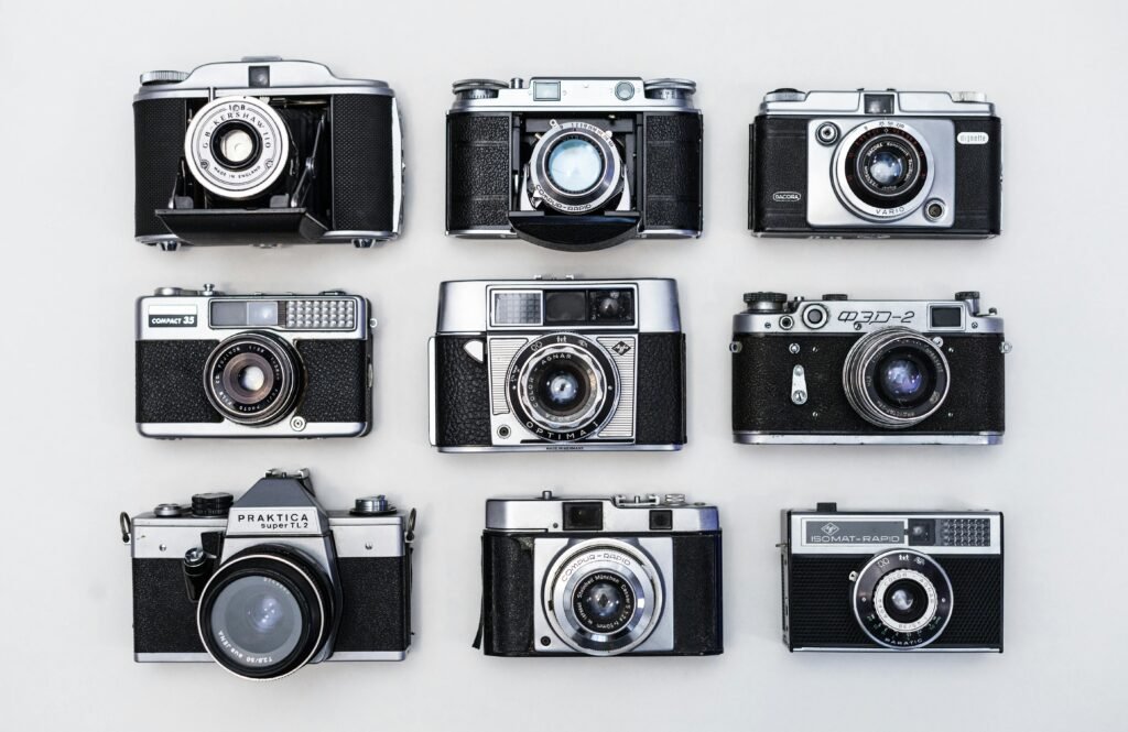 Group of different digital camera types with different specifications and sizes 